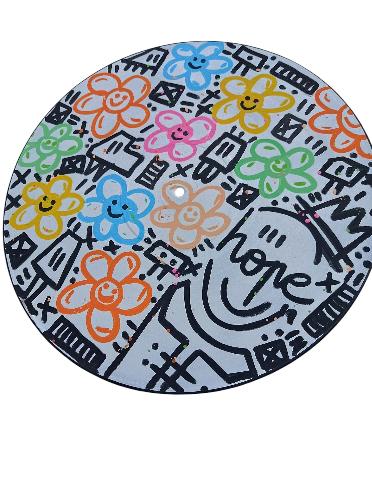 Vinyle décoratif rond avec fleurs colorées, motifs graphiques noirs, artisanat d'art, oeuvre unique, produit éco-responsable.